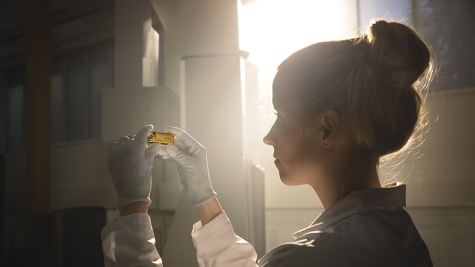 Vaisala employee looking at a Vaisala instrument