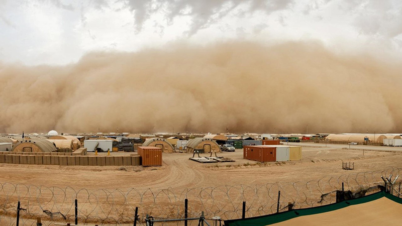 Sandstorm on desert military base.
