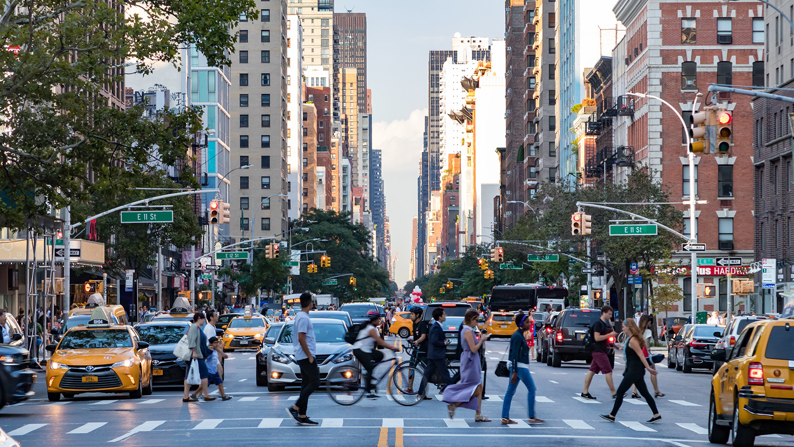 A busy crossing and traffic in a big city