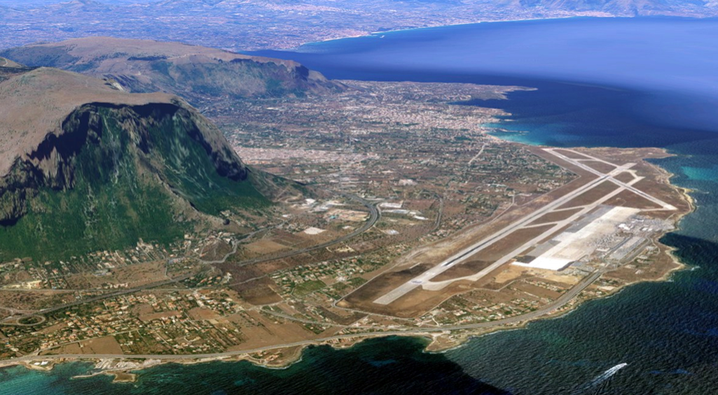 Palermo runways and the unique geographic scenario, nearby Monte Pecoraro.
