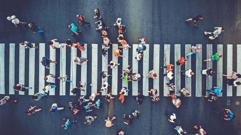 Aerial view of pedestrians on a city crossroads