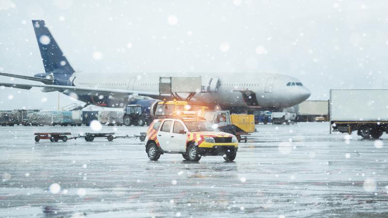 Airport and airplane in snow storm
