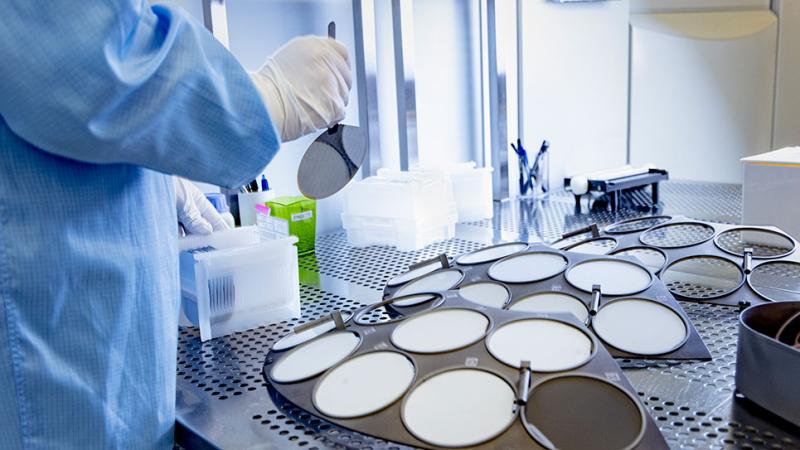 Researcher working in a cleanroom