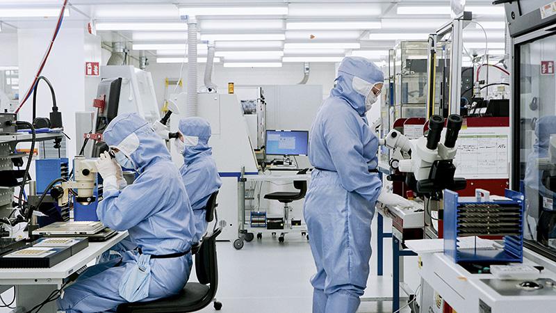 Researchers working in cleanroom