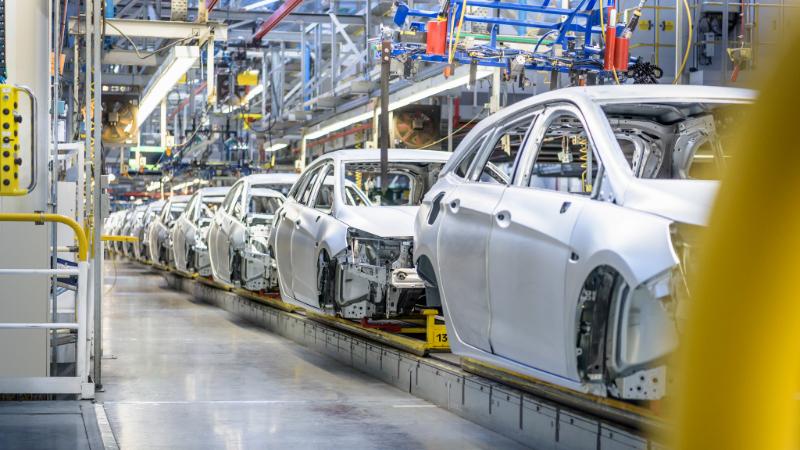 View-of-cars-on-production-line-in-factory