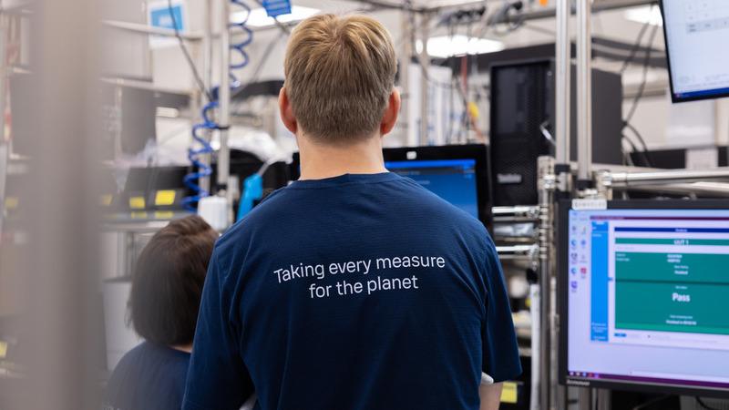 Vaisala employee in factory production cell