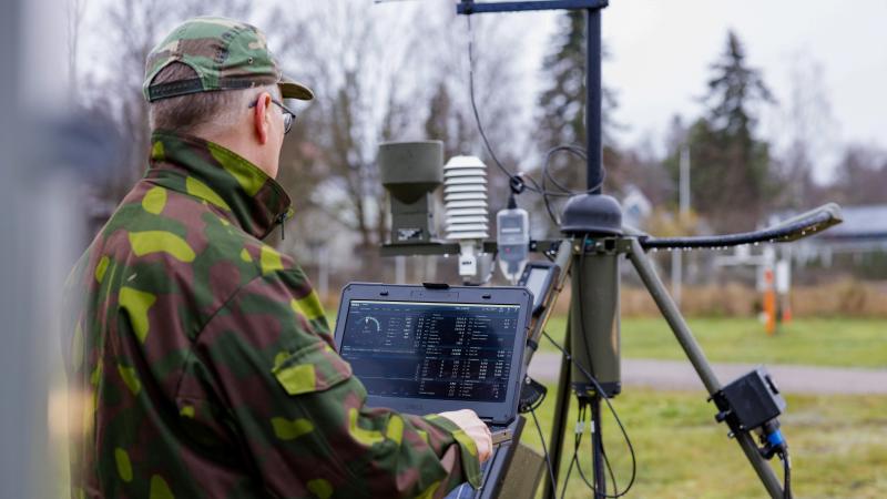 MAWS201M military person with the laptop