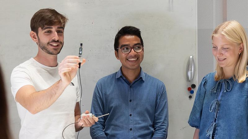 Students presenting a device