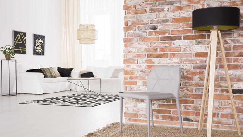 Interior of an apartment with a brick wall