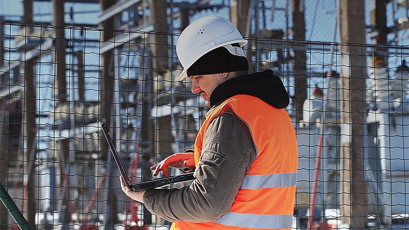 Engineer or electrician checking status step up transformer high voltage at transformer yard