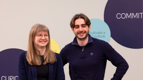 Two former Giant Leap trainees posing for camera