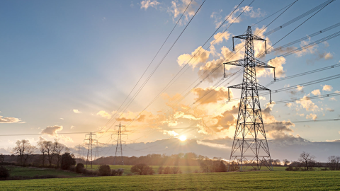 Power lines in a sunrise.