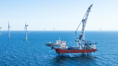 Wind farm installation - ship with helicopter landing pad