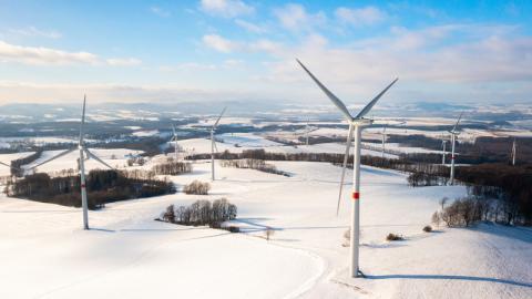Wind turbines in winter landscape