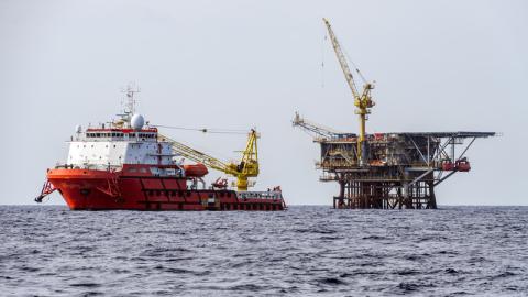 A construction support vessel and platform performing project