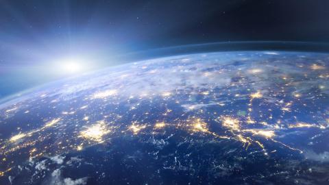 Sun rising behind Earth