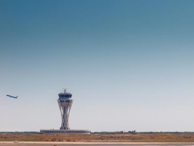 Plane taking off at El Prat airport in Barcelona, Spain