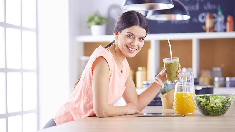 Woman drinking a smoothie