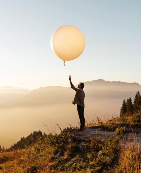 man and a weather balloon