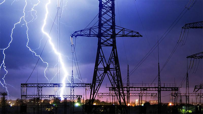Lightning over power lines