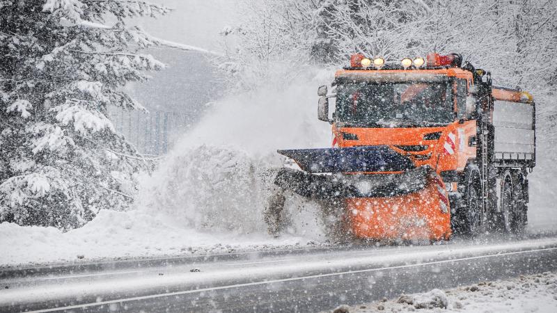 Snowplow clearing a road