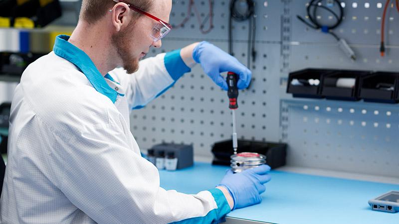 Vaisala expert doing maintenance