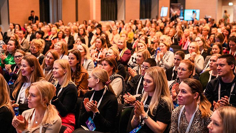 Sold out WiT Forum audience applauding