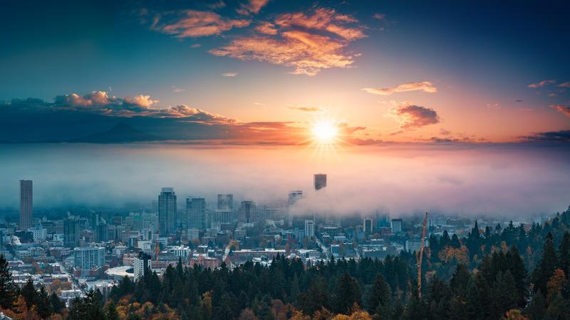Portland downtown with rolling fog and autumn foliage in shining sunrise and colorful clouds Vaisala