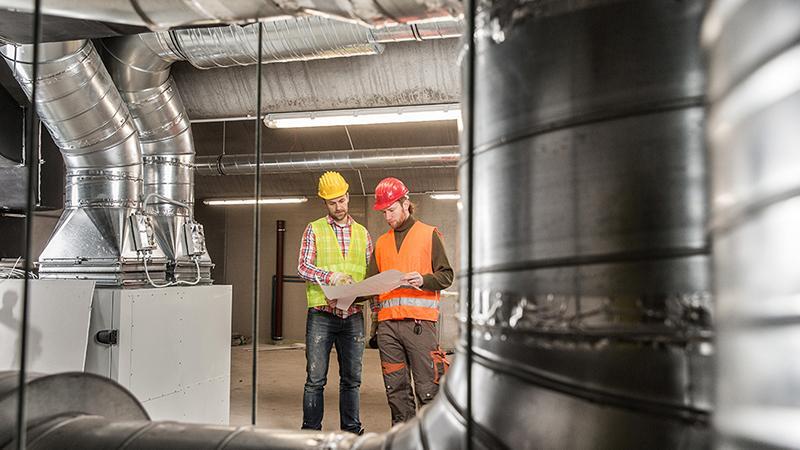 HVAC Pipes with 2 men