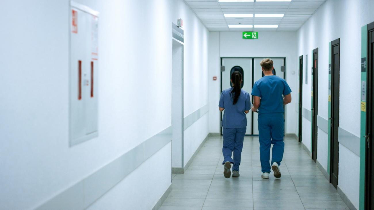 A-doctor-and-a-nurse-walking