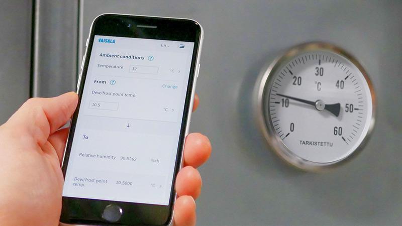 mobile humidity calculator in hand