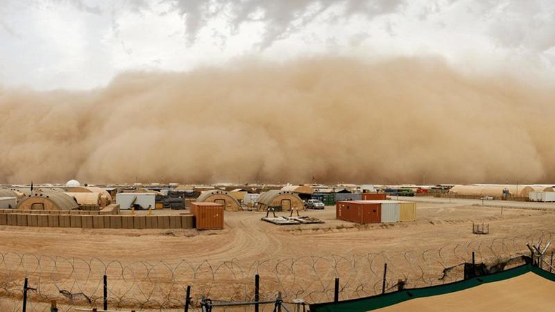 Sandstorm on desert military base.