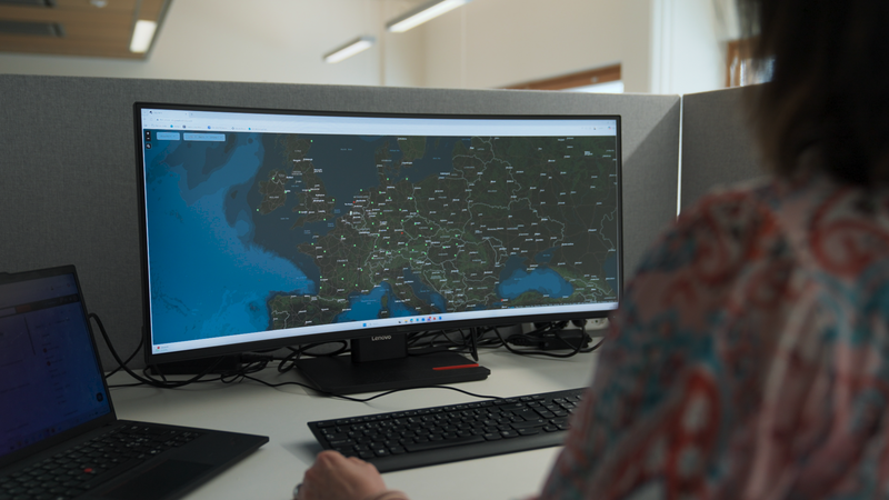 Image of service person remote monitoring the Vaisala radar network