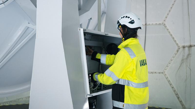 Field engineer servicing a Vaisala weather radar