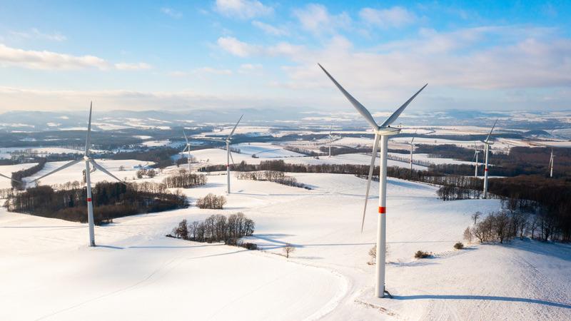 Wind turbines in winter landscape