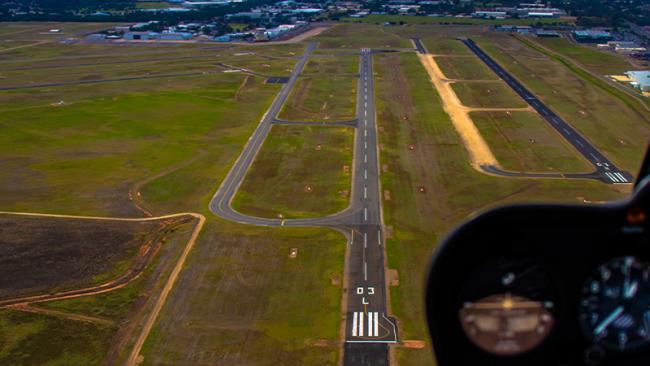 View of landing strip from an airplane cockpit