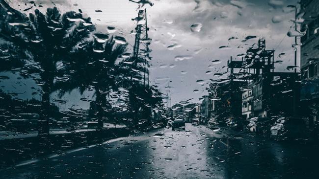 Surface weather observation with rain and precipitation