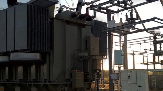 Transformer substation in heavy backlight