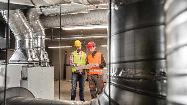 HVAC Pipes with 2 men