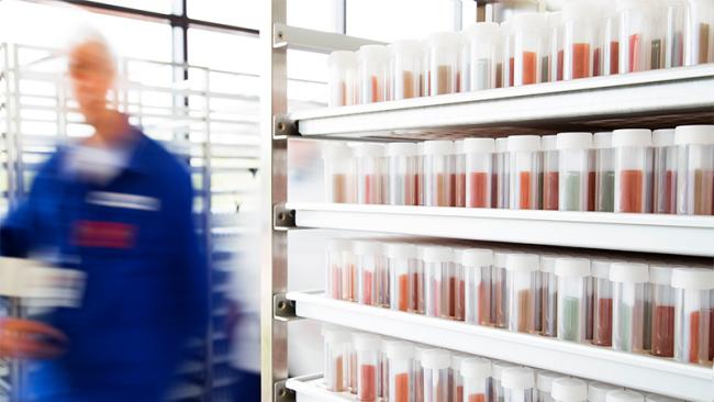 Aidian production dip slides and employee