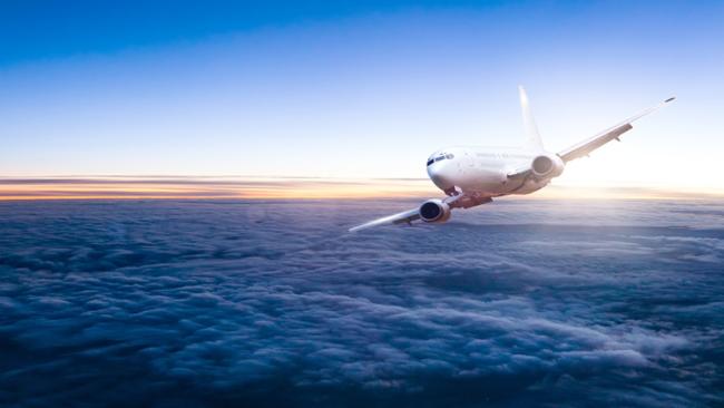 Airplane above clouds
