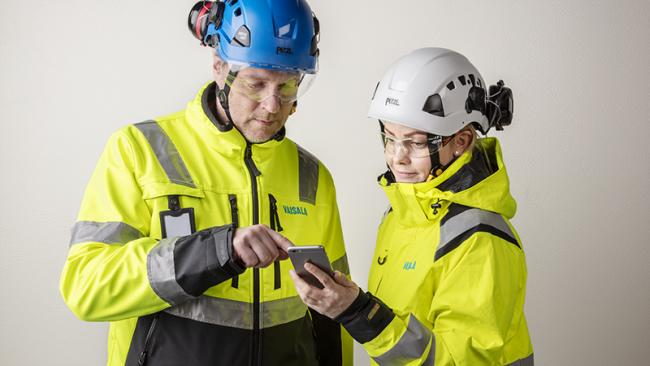 Two Vaisala engineers in hardhats