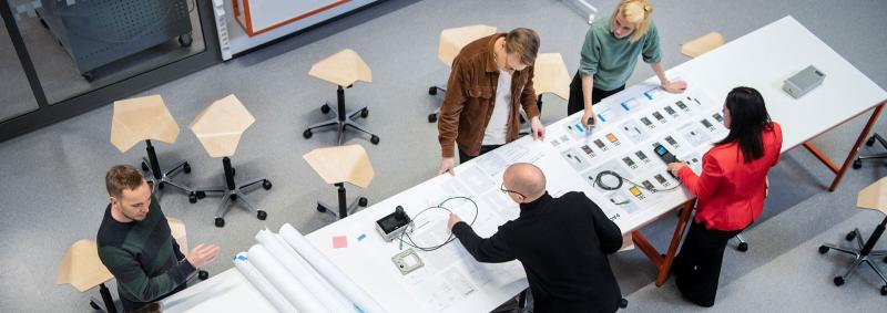 People working with whiteboard