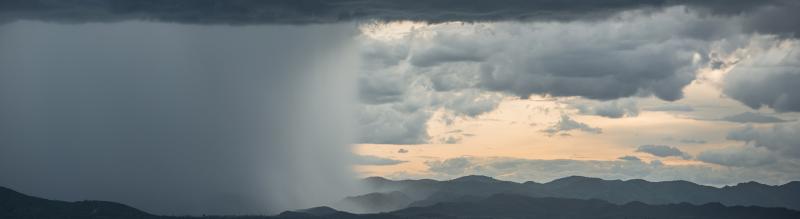 Black cloud and mountains