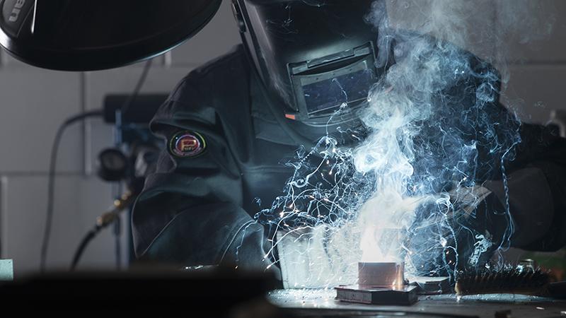 Making a prototype by soldering in a protective suit 