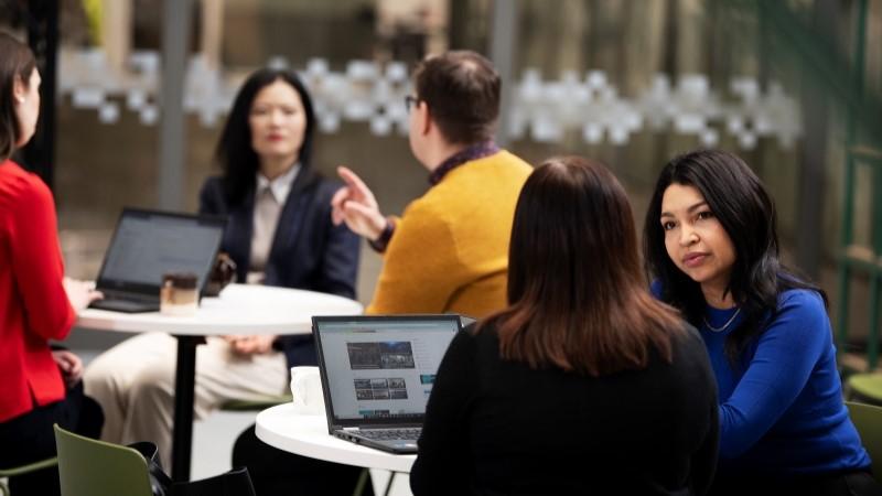 People discussing in tables