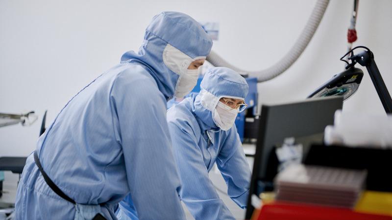 People working in cleanroom