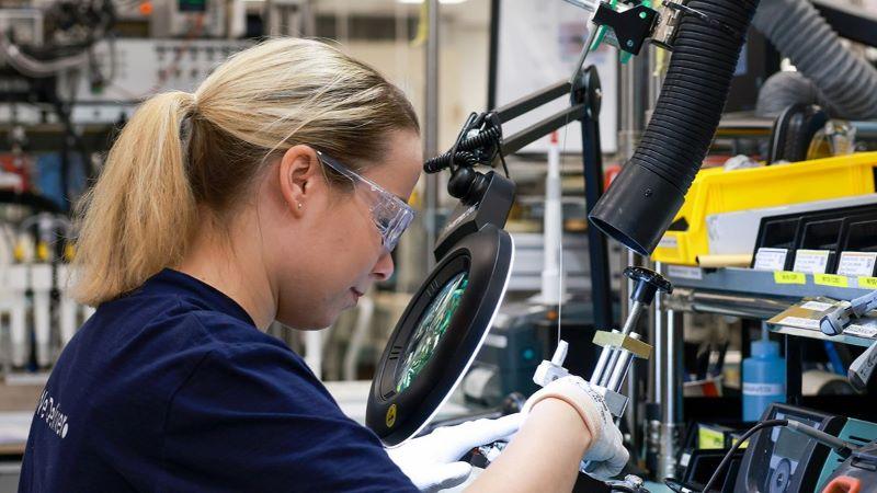 Woman working with lifecycle services technology