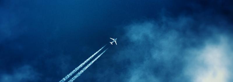 Airplane in the blue sky