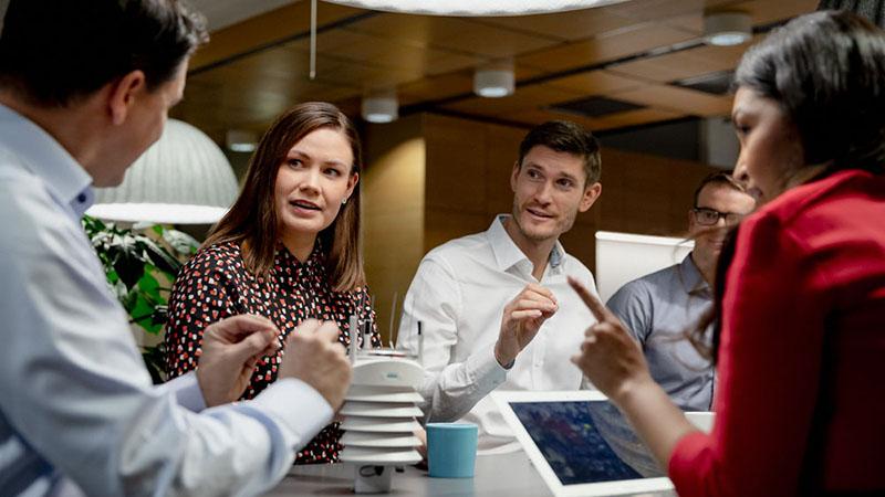 Vaisala team discussing a measurements product